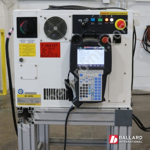 FANUC R30iB plus controller cabinet with teach pendant under power,