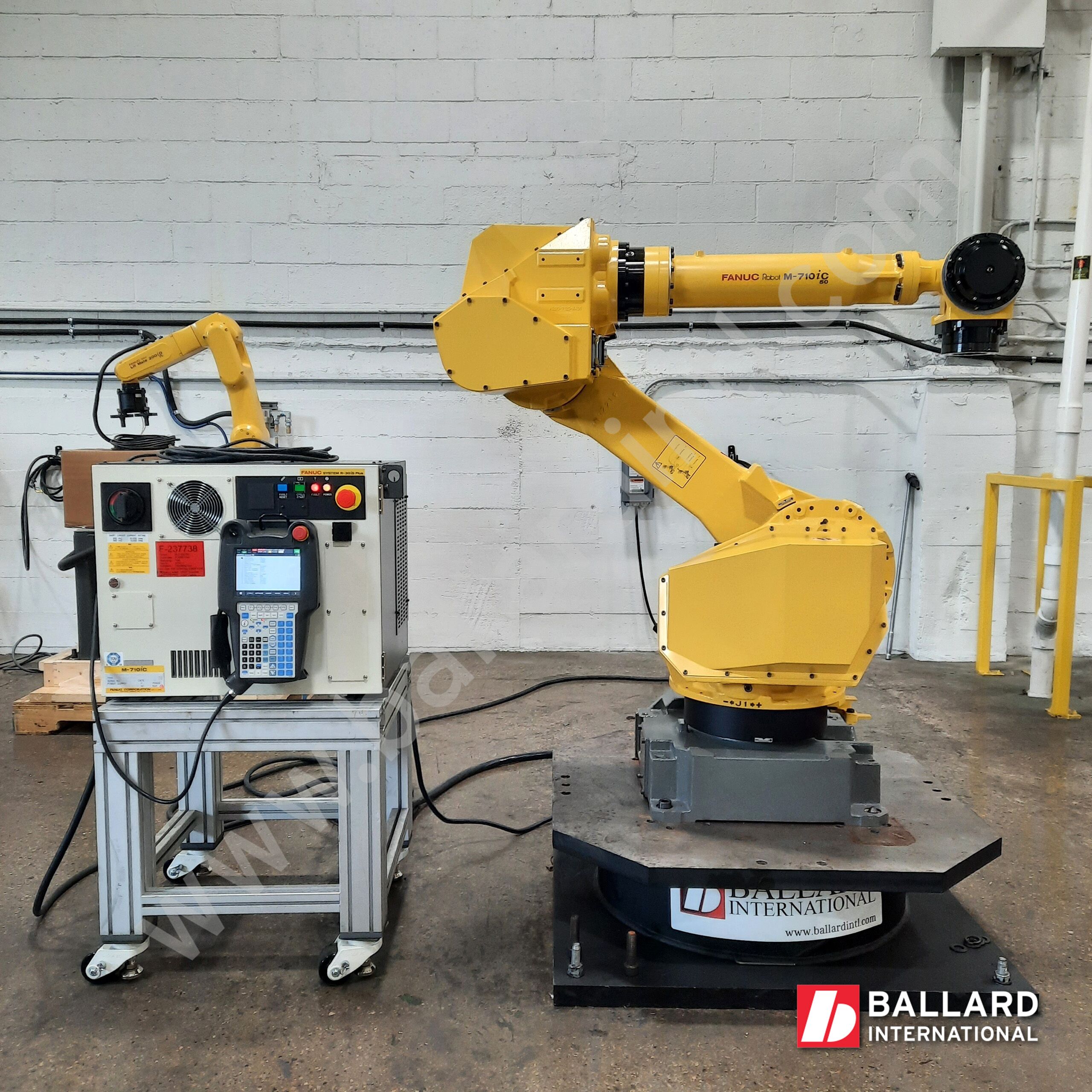 FANUC M-710iC/50 complete used industrial robot system with R30iB Plus controller and teach pendant under power F237738